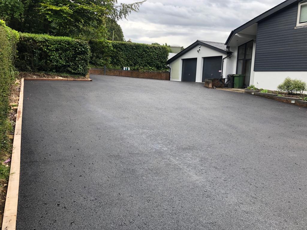This is a photo of a asphalt driveway which is in the process of being installed by Orange Road Tek